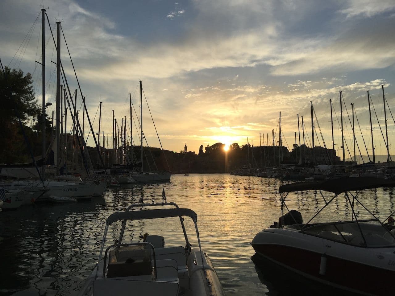 mandraki marina sunrise sunset bay yachts moored