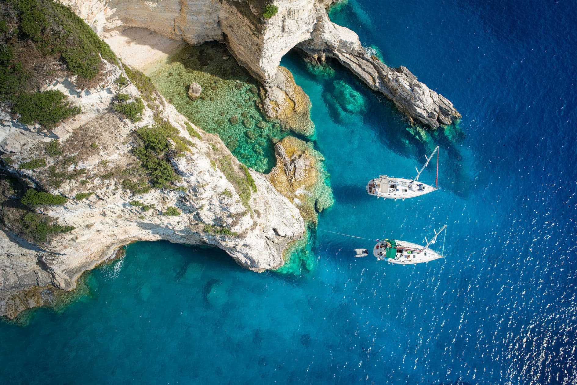 paxos yachts moored greece secluded bay