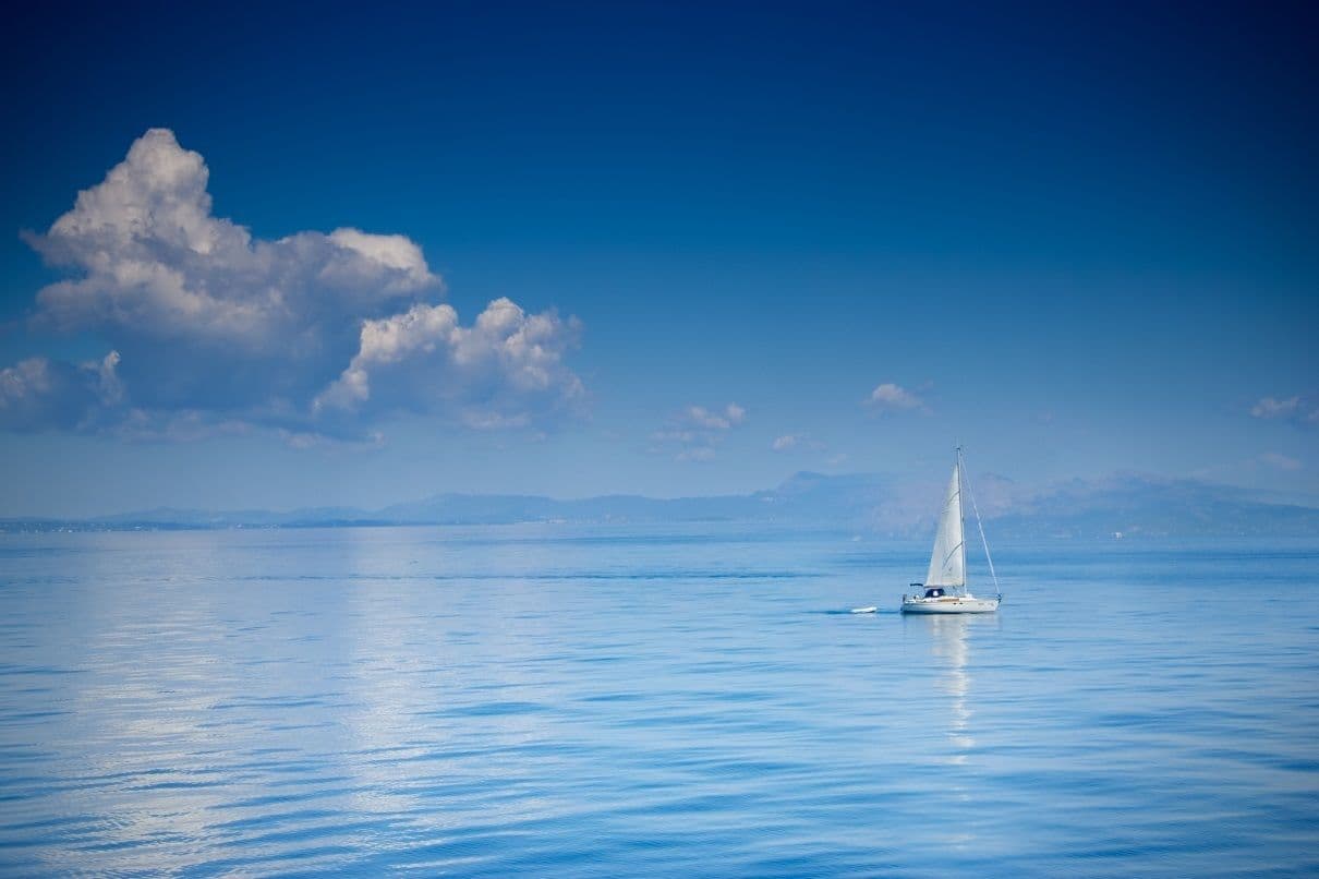 corfu yacht blue water clear sky