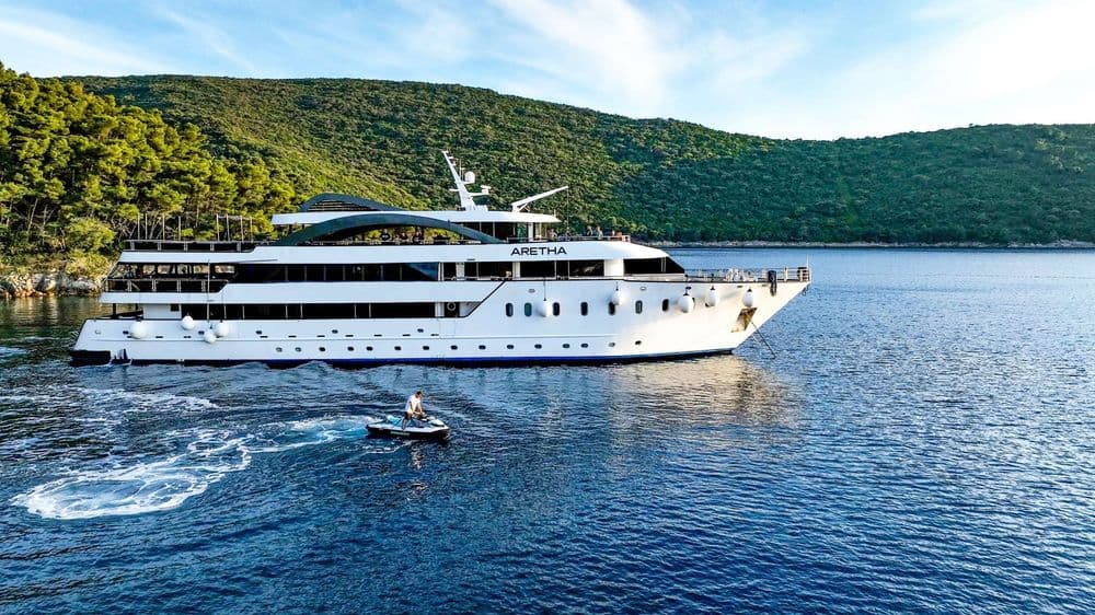 aretha exterior boat with jet ski