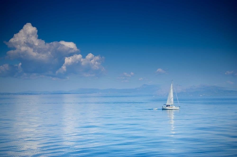 corfu yacht blue water clear sky