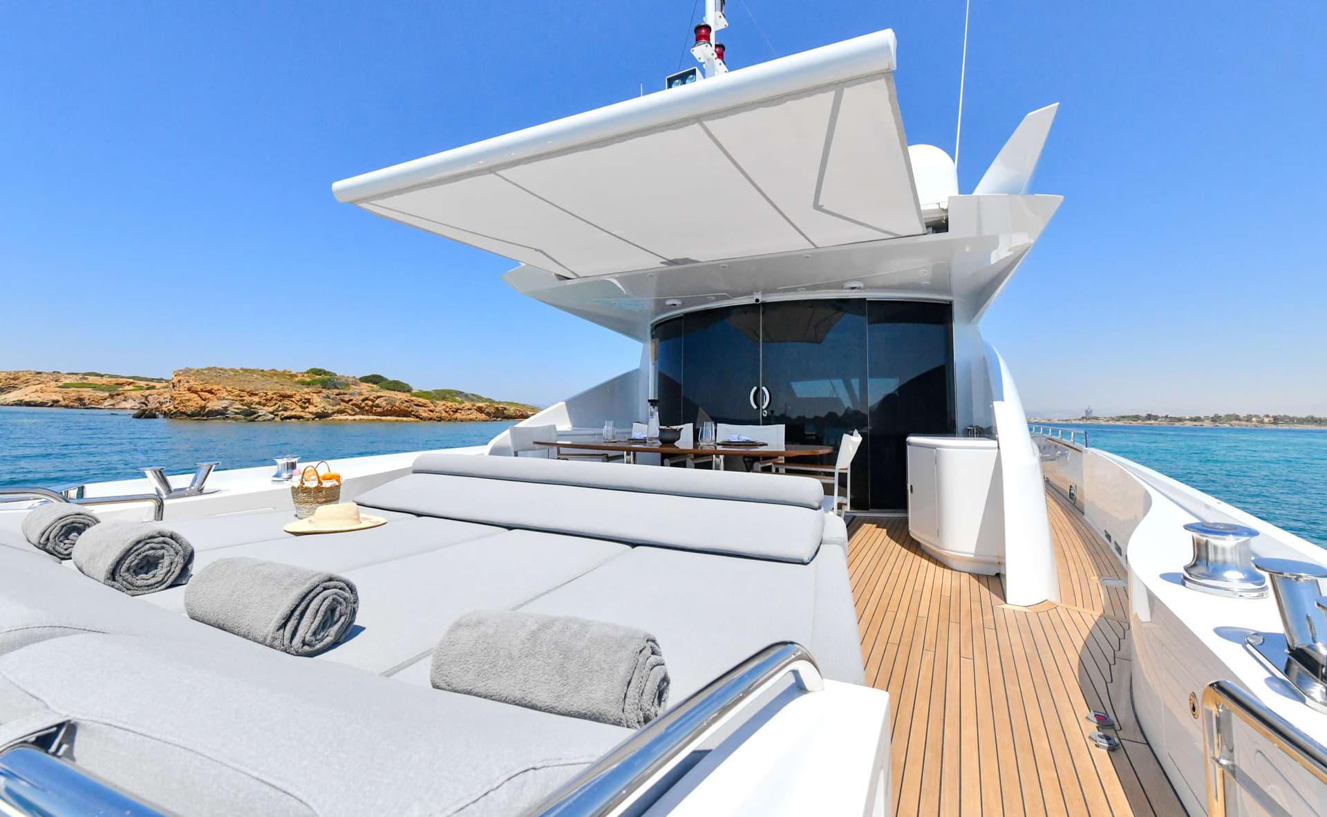 Aft deck with alfresco dining and Sunpad