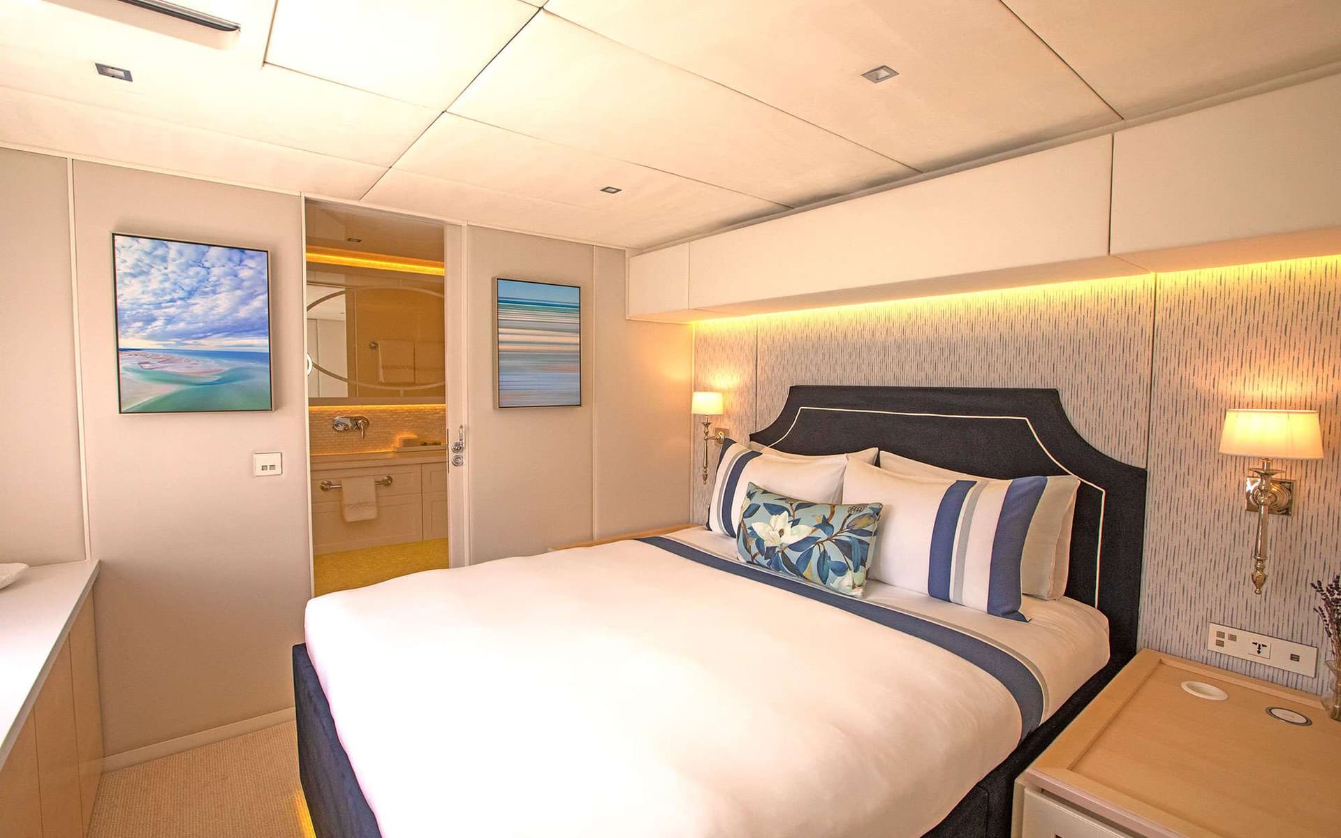 Portholes for light and views are at the foot of each bed