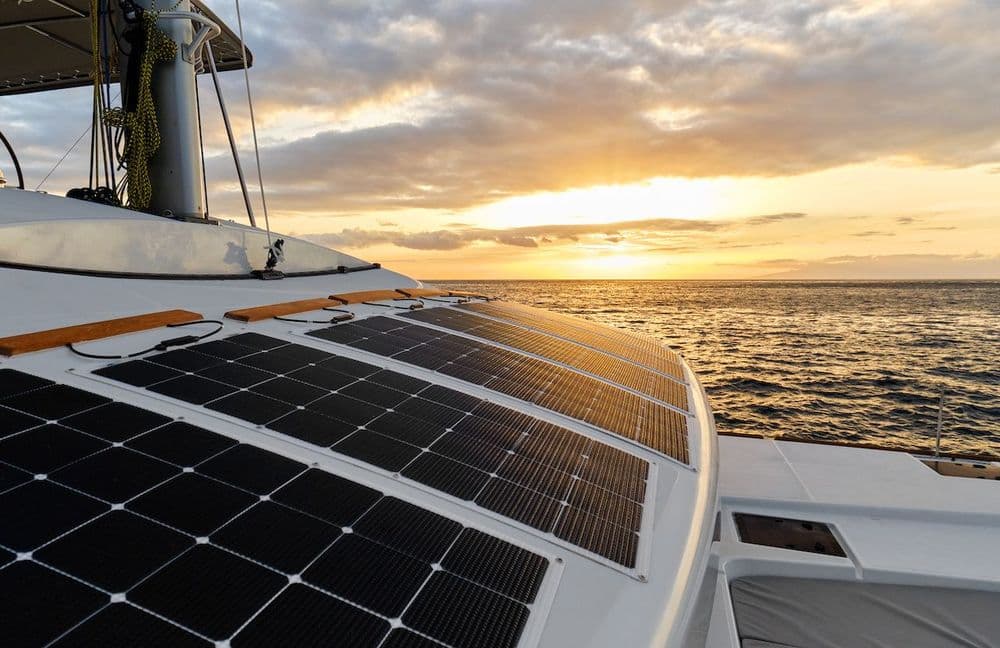 solar panels on a catamaran sunset