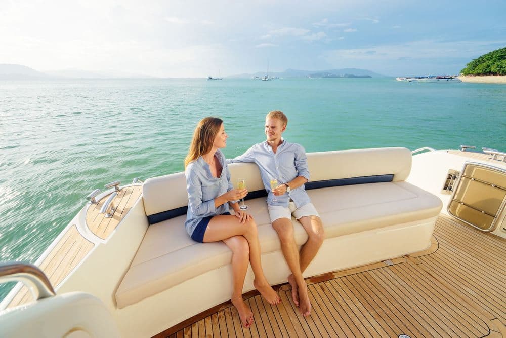 honeymoon couple sitting on stern yacht charter croatia