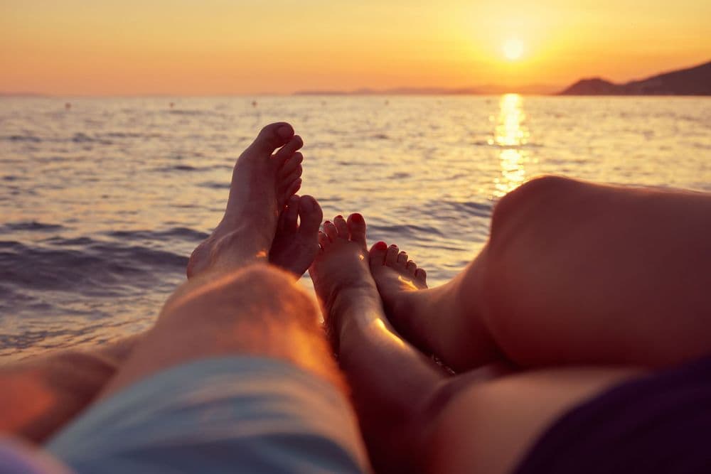 sunset couple legs croatia