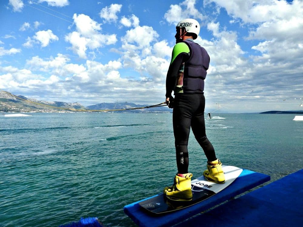 split wakepark man on water toy