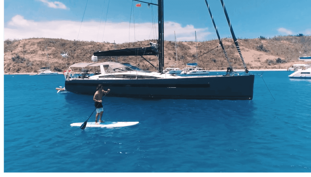 bodhisattva exterior shot boat and paddleboard