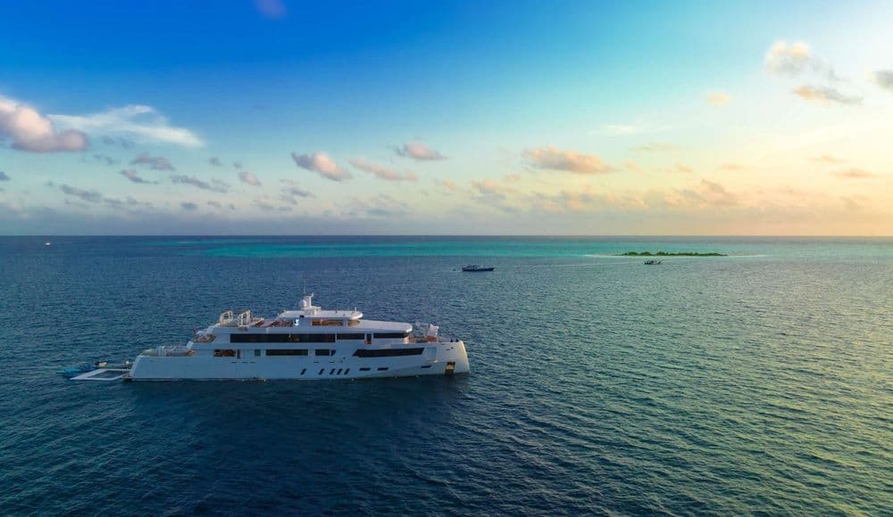 white pearl exterior aerial at sunrise