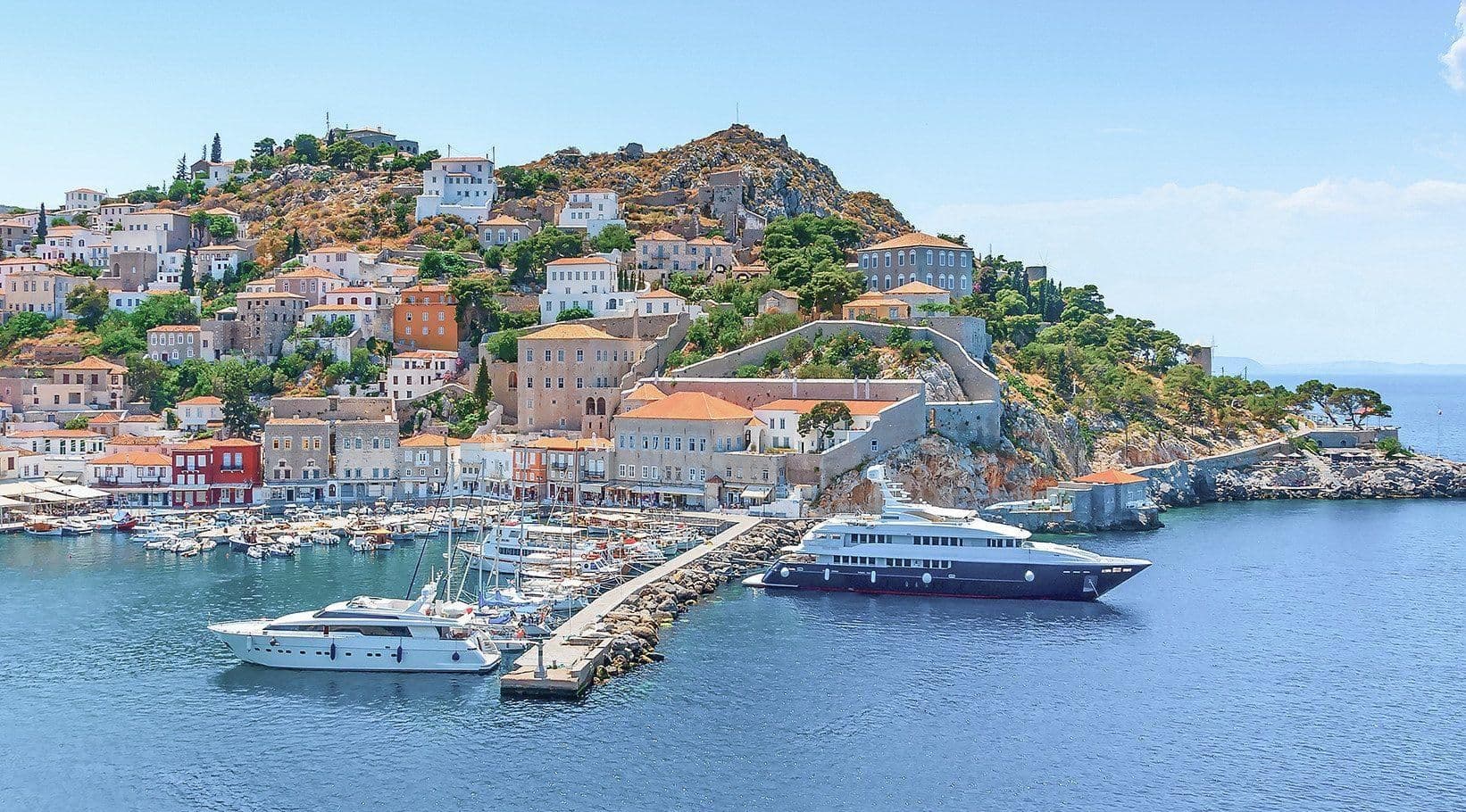 luxury motorboat in hydra mountain houses dock greece