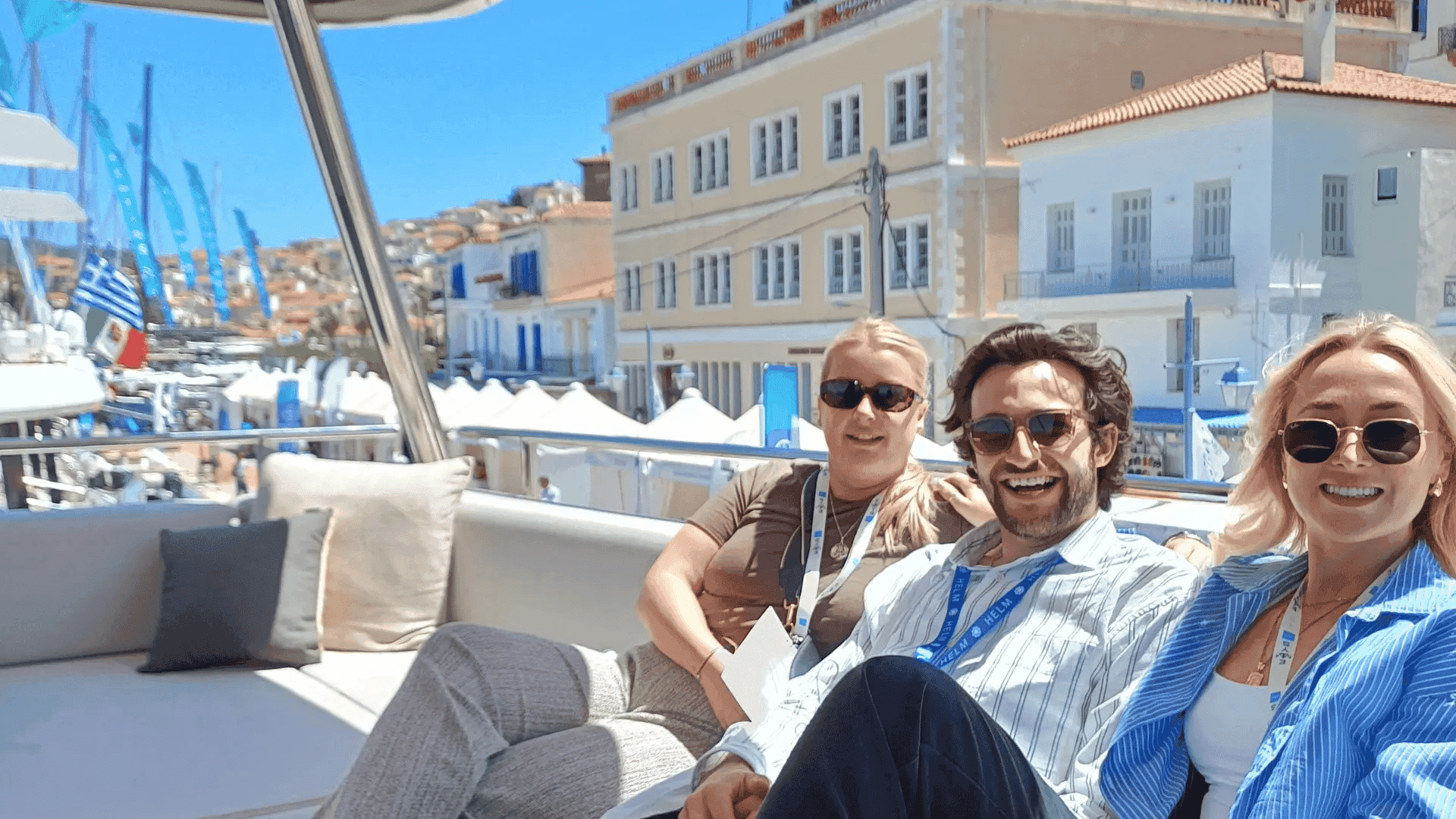 HELM Brokers Libby, Zach and Fleur on a crewed catamaran at the MEDYS yacht show