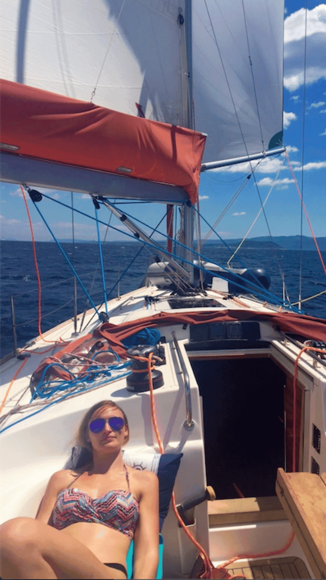 woman-relaxing-on-monohull