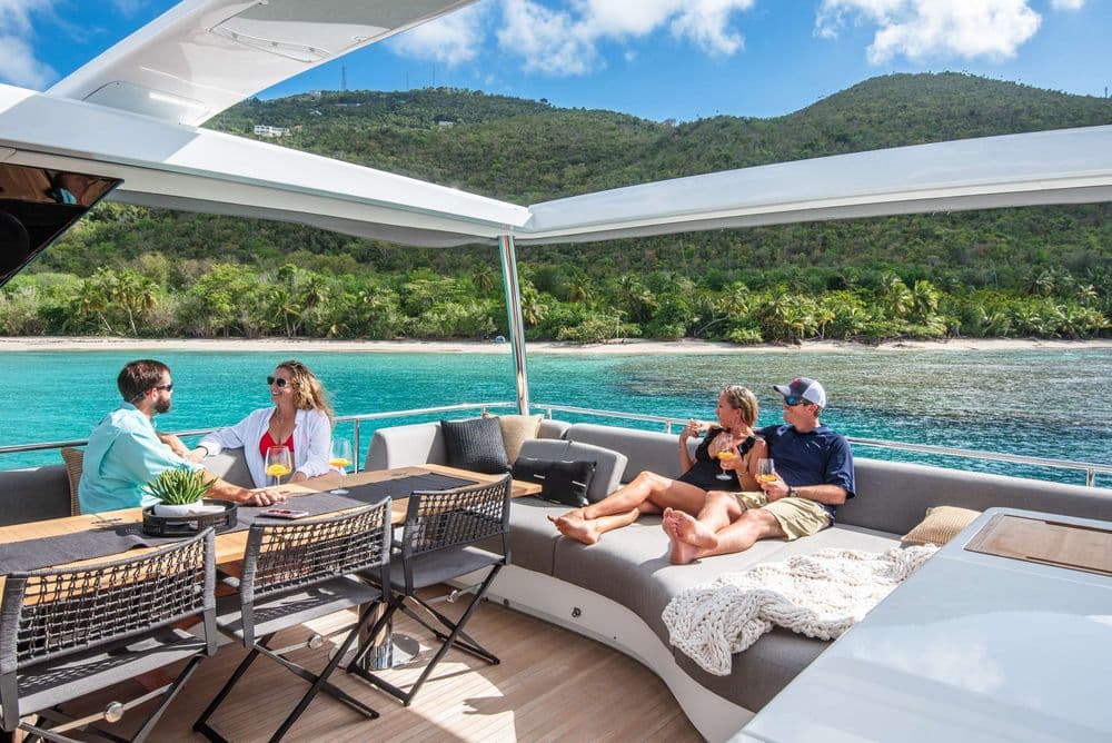 Couples Relaxing on Crewed Catamaran BVI