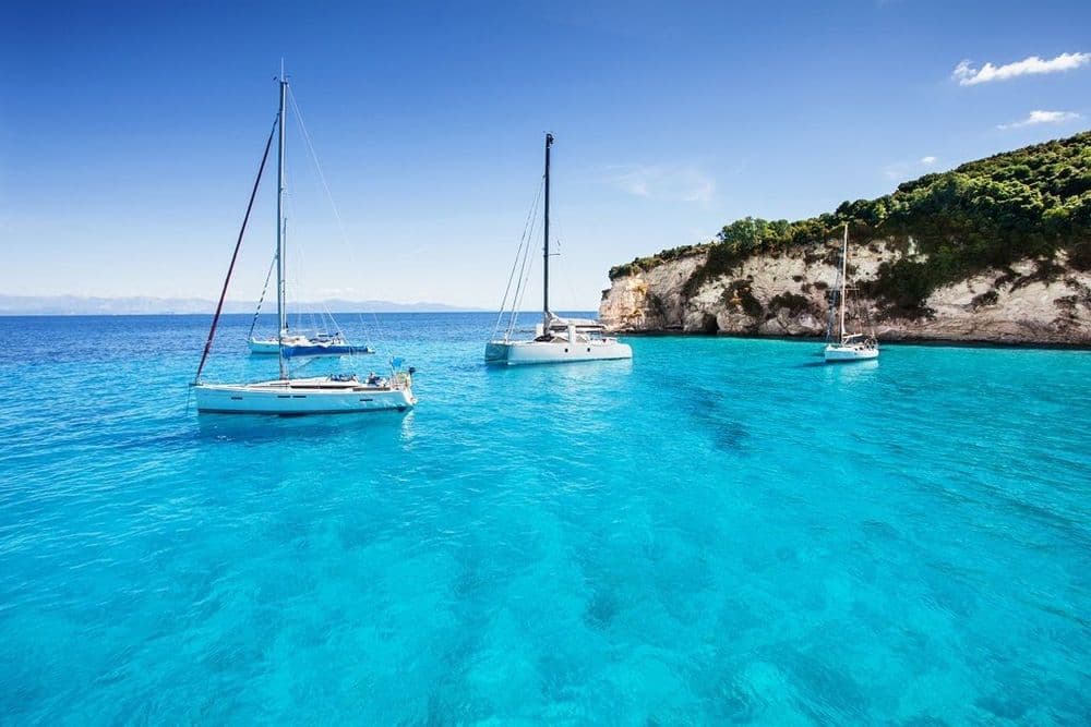 Two Boats in Blue Water