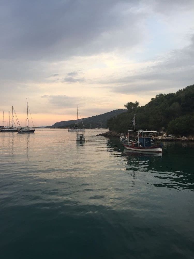 sivota islands red sunset over water