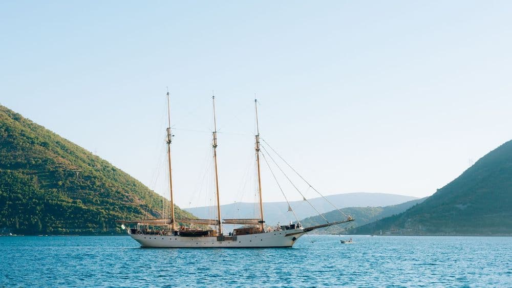 gulet-anchored-near-mountain