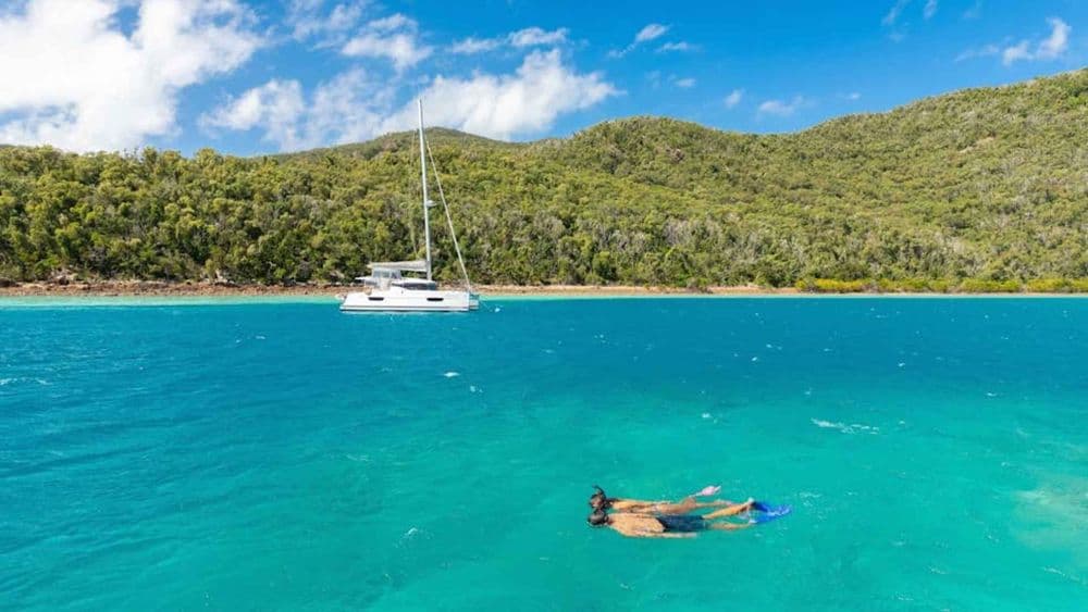 butterfly bay two people snorkelling whitsundays