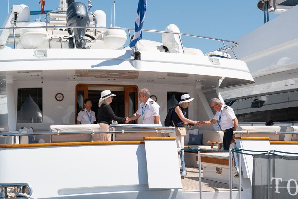 medys brokers shaking crew hands